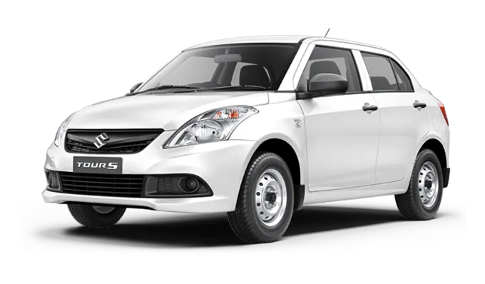 A white Maruti Dzire sedan